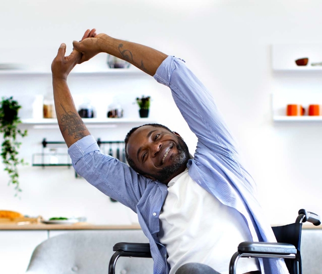 man stretches hands