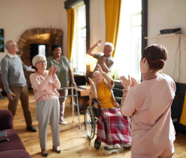 smiling people dancing while enjoying activities